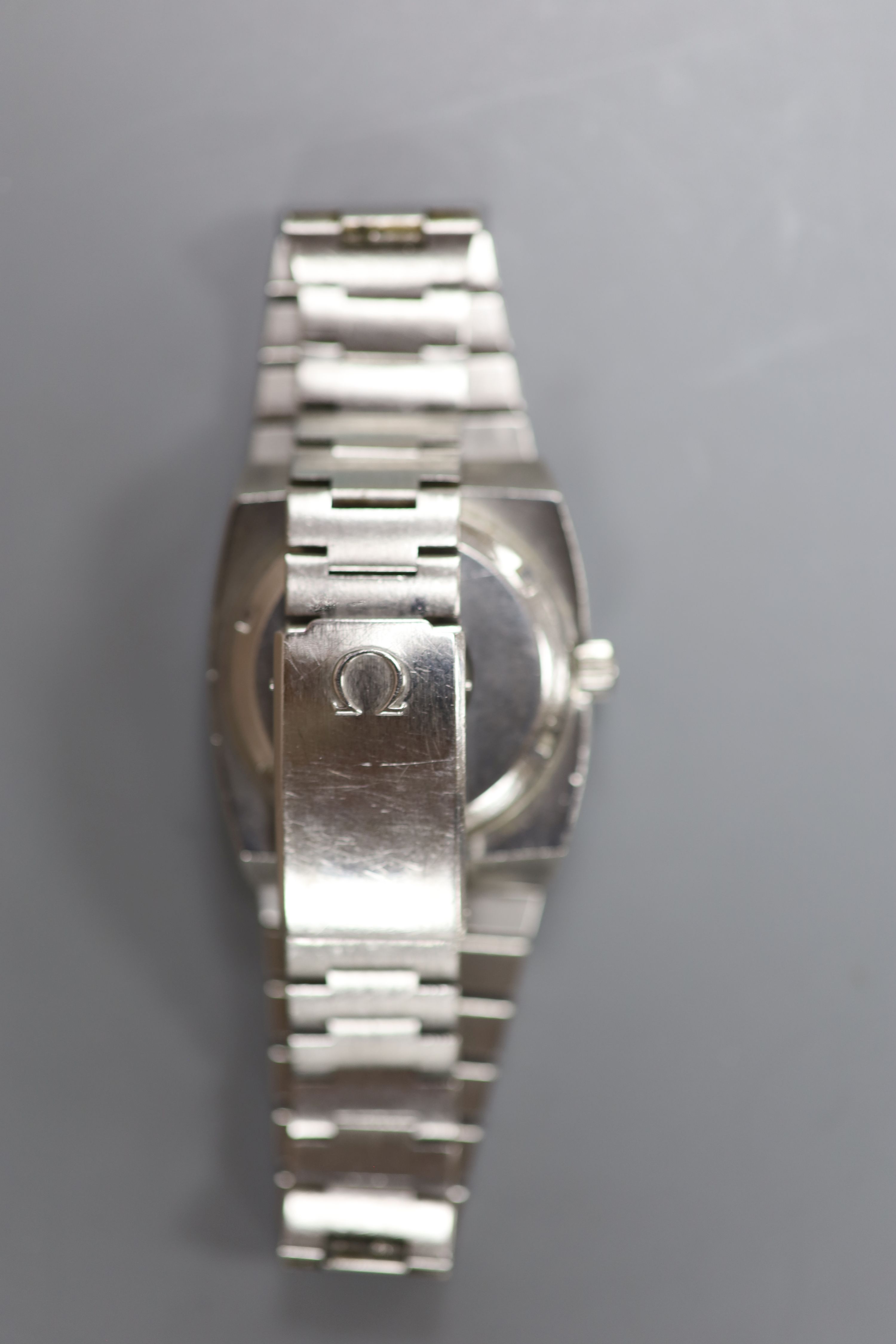 A gentleman's stainless steel Omega Megaquartz 32KHz wrist watch, on stainless steel Omega bracelet, case diameter 31mm.